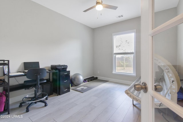 office area with ceiling fan and light hardwood / wood-style floors