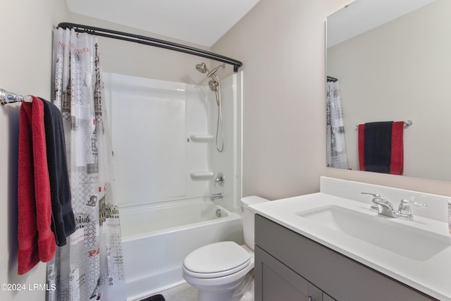 full bathroom featuring shower / tub combo with curtain, vanity, and toilet