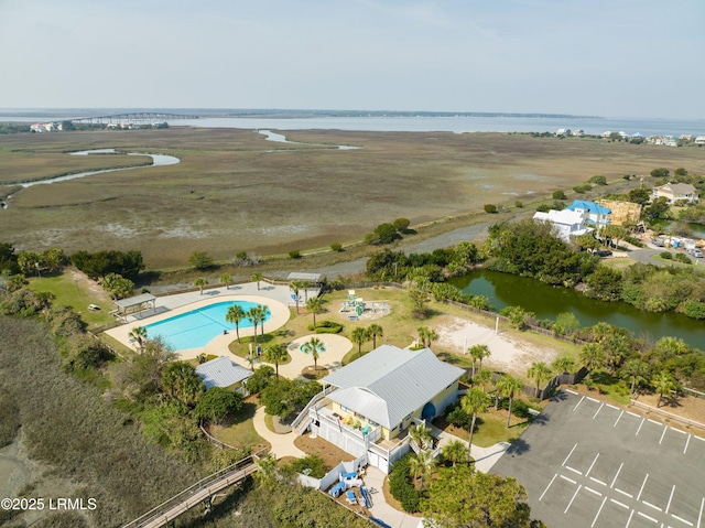 birds eye view of property featuring a water view