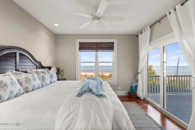 bedroom featuring baseboards, a ceiling fan, dark wood-type flooring, access to outside, and recessed lighting