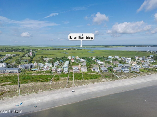 birds eye view of property with a residential view and a water view