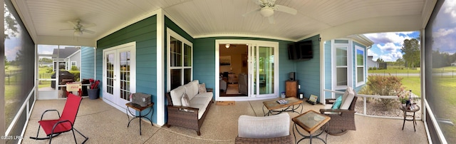 view of patio with french doors and a ceiling fan