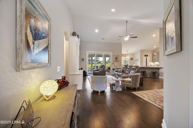 living area featuring recessed lighting, a ceiling fan, vaulted ceiling, and dark wood-style floors