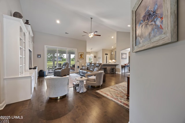 living area with high vaulted ceiling, a ceiling fan, recessed lighting, and dark wood-style floors