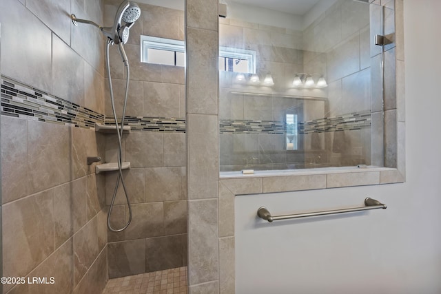 bathroom with tiled shower