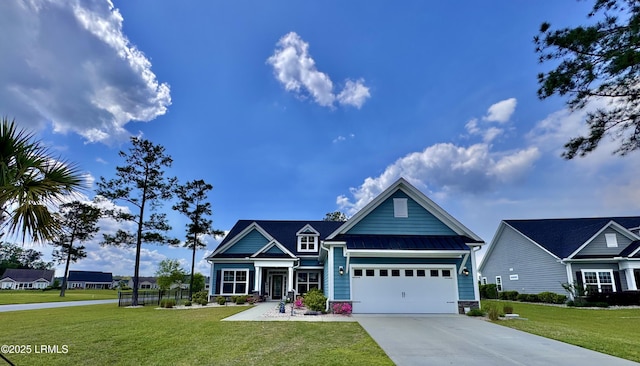 view of front of home with a front yard, an attached garage, metal roof, and driveway