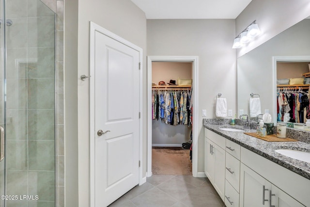265 Beachcomber Blvd, Hardeeville, SC 29927 - full bath with double vanity, a stall shower, tile patterned flooring, and a sink