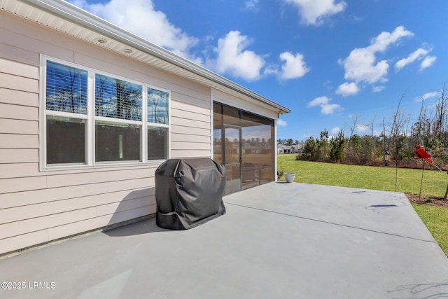 265 Beachcomber Blvd, Hardeeville, SC 29927 - view of patio with a sunroom and grilling area
