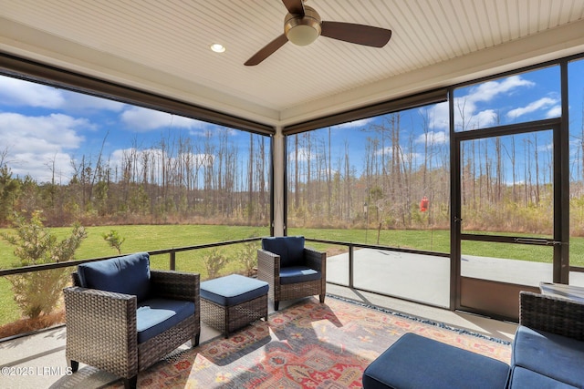 265 Beachcomber Blvd, Hardeeville, SC 29927 - unfurnished sunroom with a ceiling fan and a view of trees