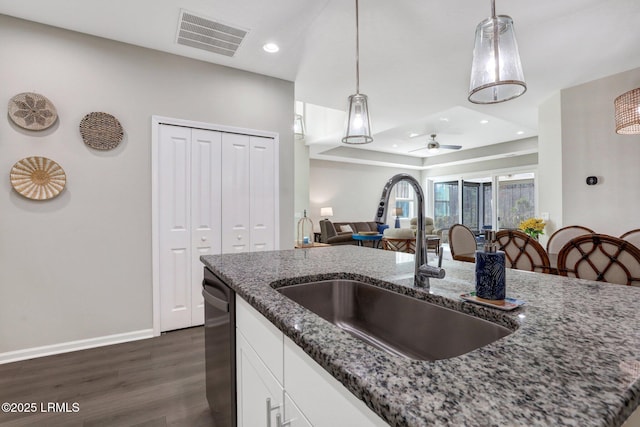 265 Beachcomber Blvd, Hardeeville, SC 29927 - kitchen with stone counters, visible vents, hanging light fixtures, a sink, and dishwasher