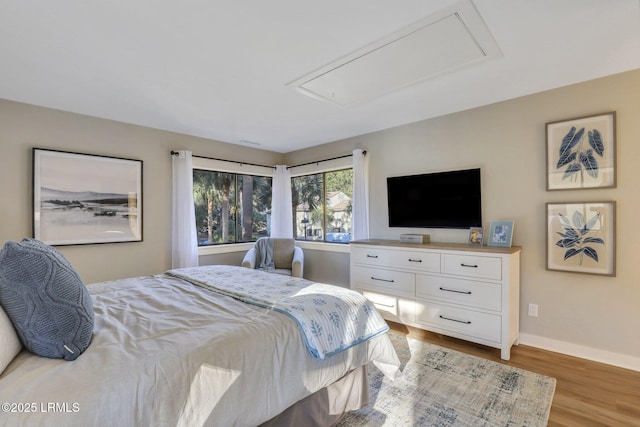 bedroom featuring light wood-type flooring