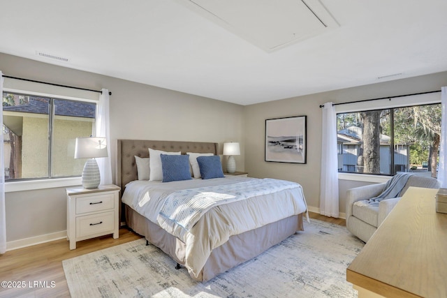 bedroom featuring light hardwood / wood-style floors