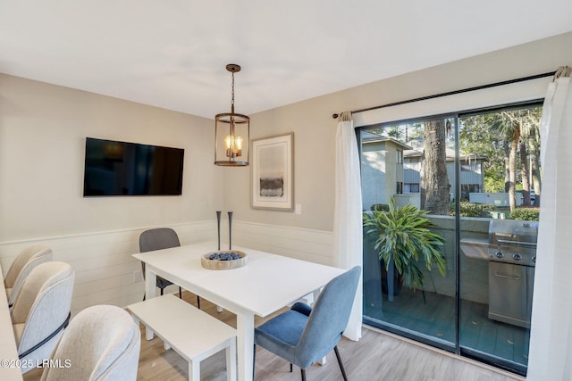 dining space featuring light hardwood / wood-style flooring