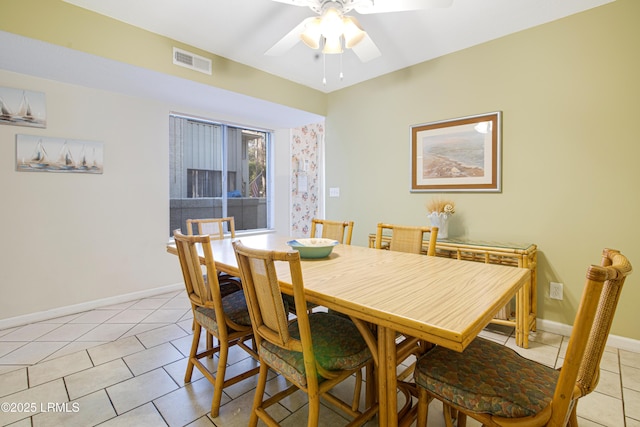 dining area featuring light tile patterned flooring and ceiling fan