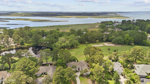 283 Seabrook Dr, Hilton Head Island, SC 29926 - aerial overview of property's location with a large body of water, a golf course, nearby suburban area, and a tree filled landscape
