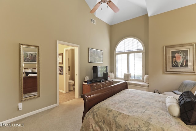 283 Seabrook Dr, Hilton Head Island, SC 29926 - bedroom featuring high vaulted ceiling, carpet floors, baseboards, and connected bathroom