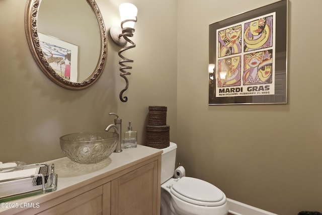 283 Seabrook Dr, Hilton Head Island, SC 29926 - bathroom featuring vanity, toilet, and baseboards