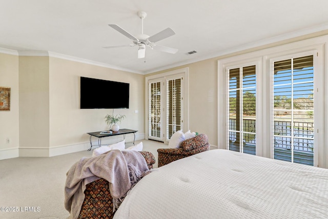 bedroom with baseboards, visible vents, access to outside, crown molding, and carpet flooring