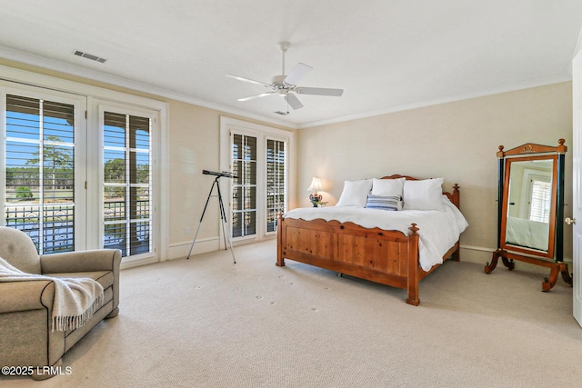 bedroom with visible vents, a ceiling fan, access to exterior, crown molding, and carpet flooring