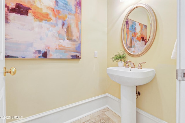 bathroom with baseboards