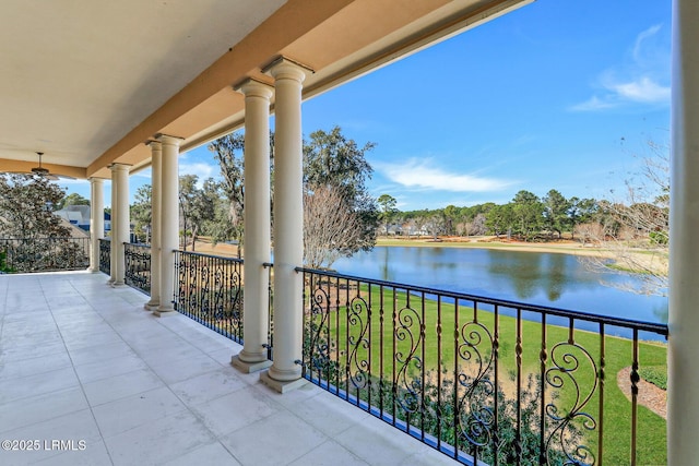 balcony featuring a water view