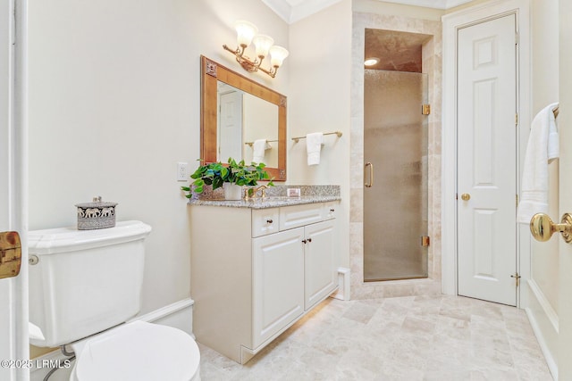 bathroom featuring a shower stall, toilet, and vanity