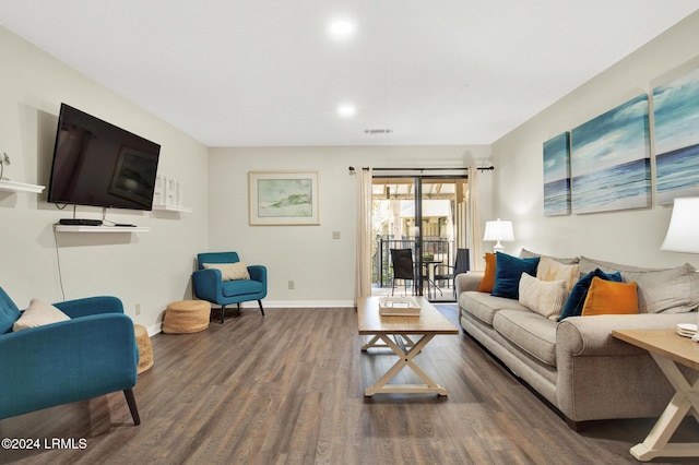 living room with dark wood-type flooring