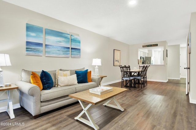 living room featuring dark hardwood / wood-style flooring