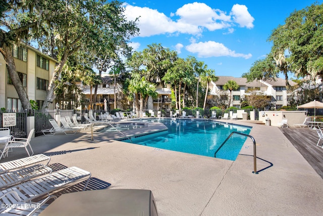 view of pool featuring a patio