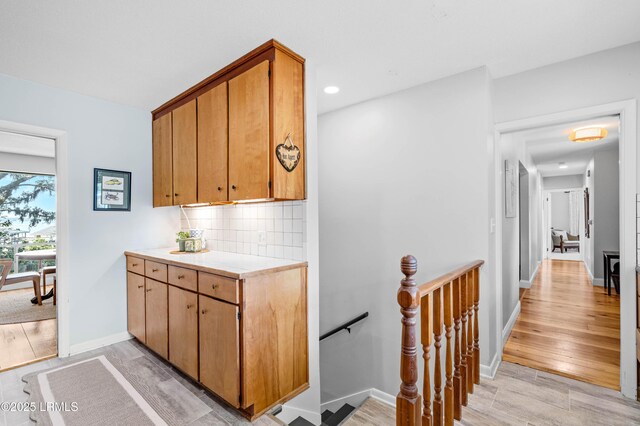 36 Stuart Town Ct, Beaufort, SC 29902 - bar with backsplash, baseboards, light wood-style flooring, and recessed lighting