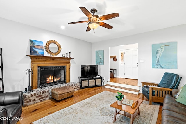 36 Stuart Town Ct, Beaufort, SC 29902 - living area featuring wood finished floors, ceiling fan, and a brick fireplace
