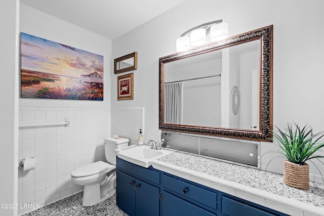 36 Stuart Town Ct, Beaufort, SC 29902 - bathroom featuring toilet, vanity, tile walls, curtained shower, and speckled floor