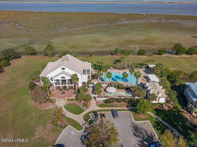 bird's eye view with a water view and a rural view