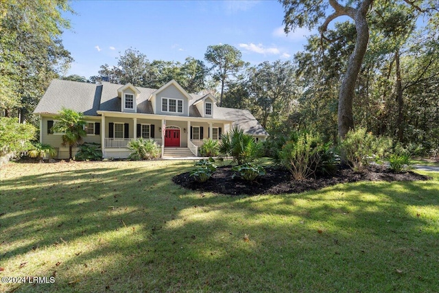 cape cod-style house with a front lawn and a porch