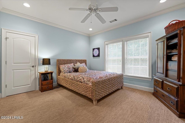 bedroom featuring ceiling fan, ornamental molding, and light carpet