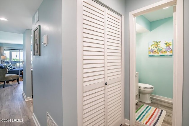 hallway featuring light hardwood / wood-style floors