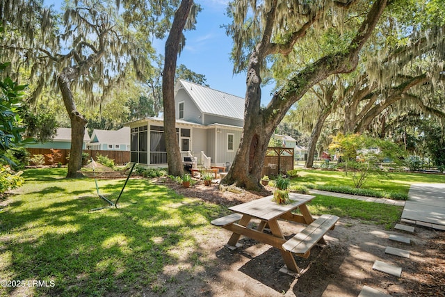 1108 12th St, Port Royal, SC 29935 - view of yard featuring a sunroom