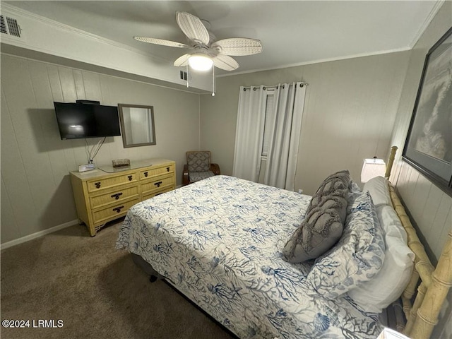 bedroom with crown molding, ceiling fan, and dark colored carpet