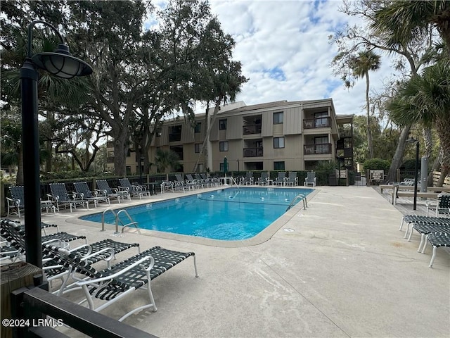 view of pool featuring a patio area