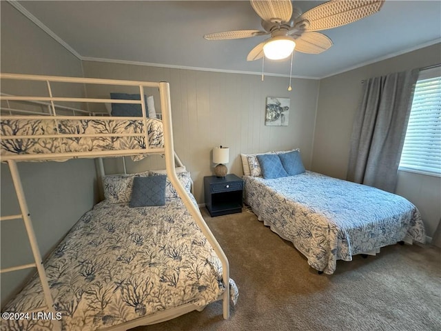 bedroom with dark carpet, ornamental molding, and ceiling fan