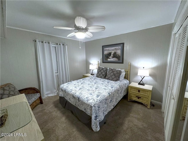 bedroom with crown molding, ceiling fan, and dark colored carpet