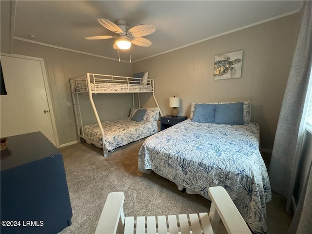 bedroom with crown molding, carpet floors, and ceiling fan