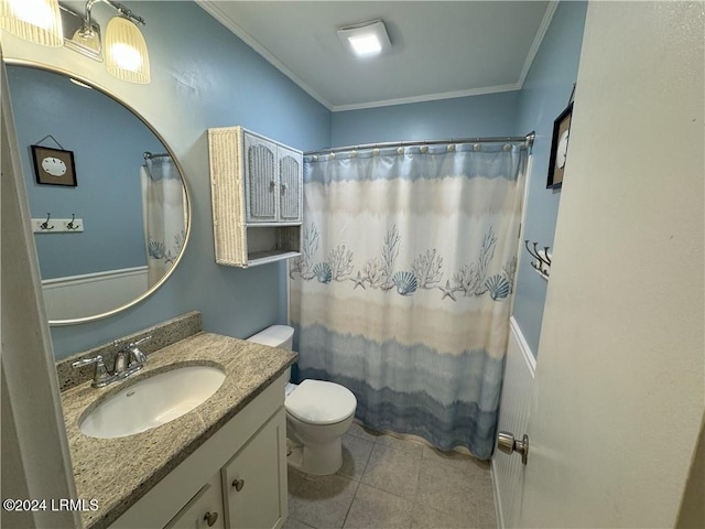 bathroom featuring crown molding, tile patterned floors, vanity, and toilet