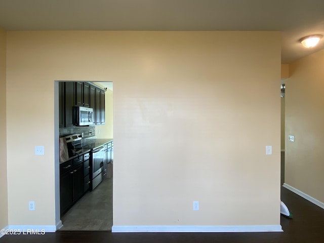 204 Mission Way, Beaufort, SC 29906 - kitchen with appliances with stainless steel finishes, decorative backsplash, and baseboards