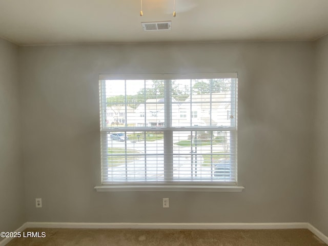 204 Mission Way, Beaufort, SC 29906 - empty room featuring carpet flooring, healthy amount of natural light, and baseboards