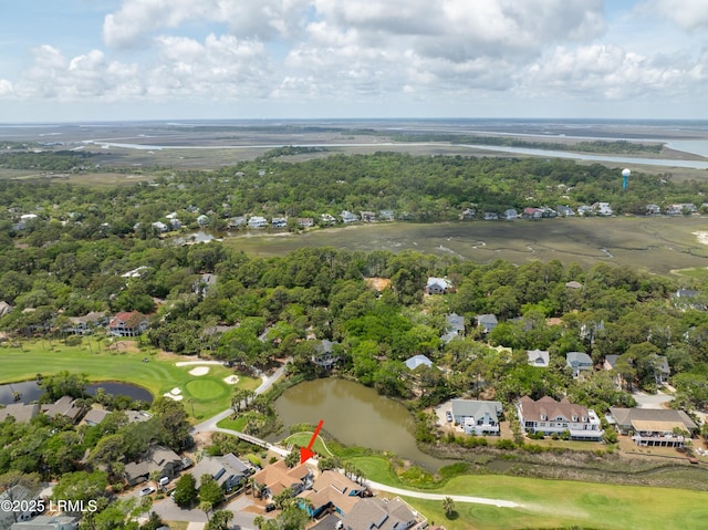 birds eye view of property featuring a water view, a residential view, and view of golf course