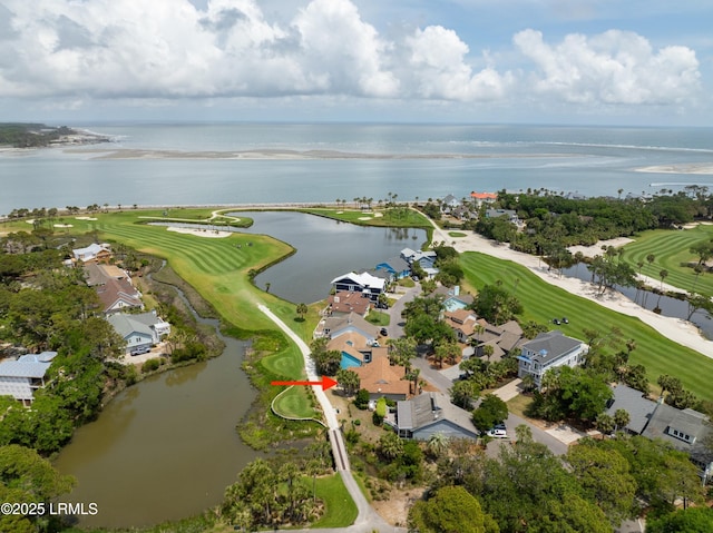 birds eye view of property featuring a residential view, golf course view, and a water view
