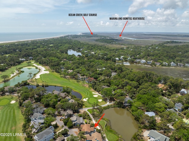 bird's eye view featuring view of golf course, a water view, and a residential view
