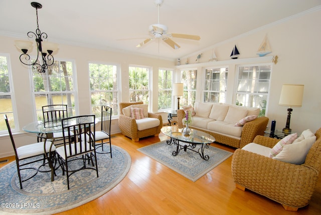 sunroom with a chandelier