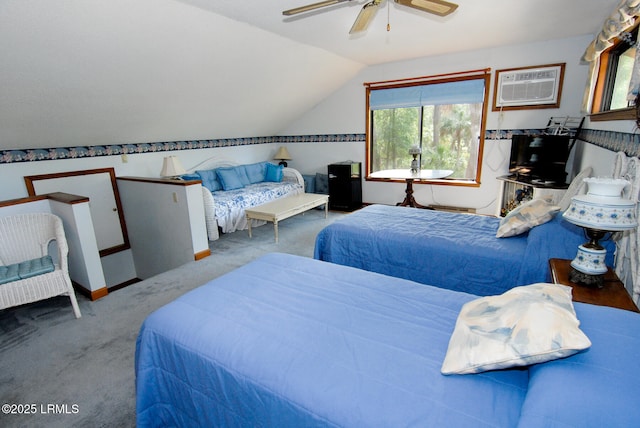 carpeted bedroom featuring an AC wall unit, a ceiling fan, baseboards, and lofted ceiling